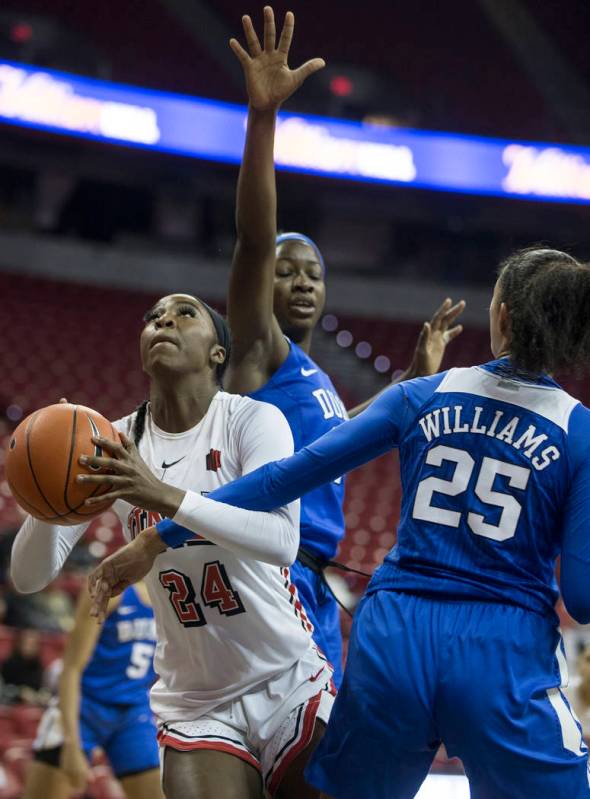 UNLV Lady Rebels guard Rodjanae Wade (24) slices past Duke Blue Devils forward Jade Williams ( ...