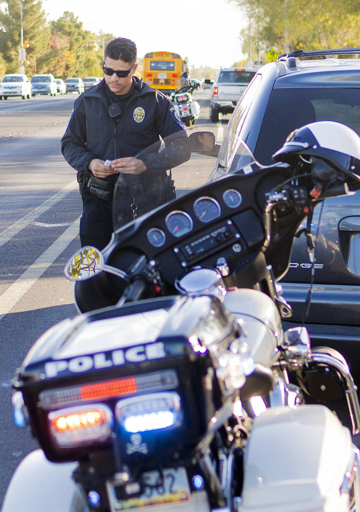 Officer Chris Lourenco of "Fab Five," the five-member traffic unit of Clark County S ...