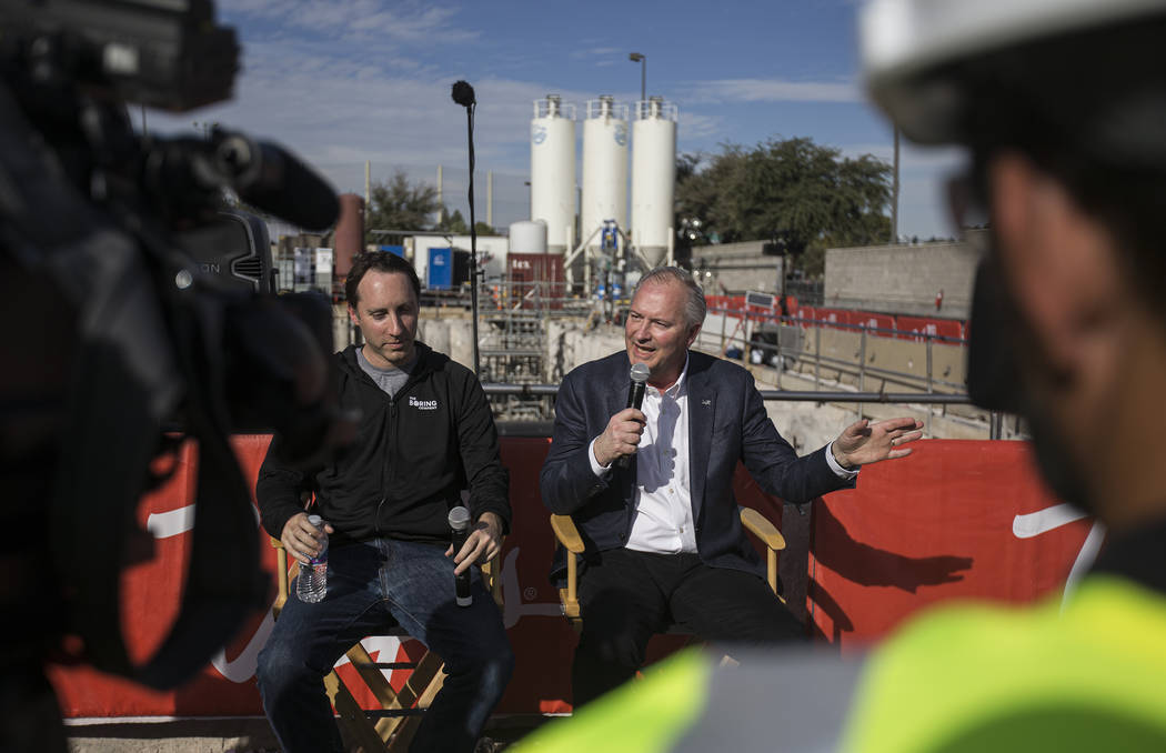 Steve Hill, right, Chief Executive Officer of the Las Vegas Convention and Visitors Authority, ...