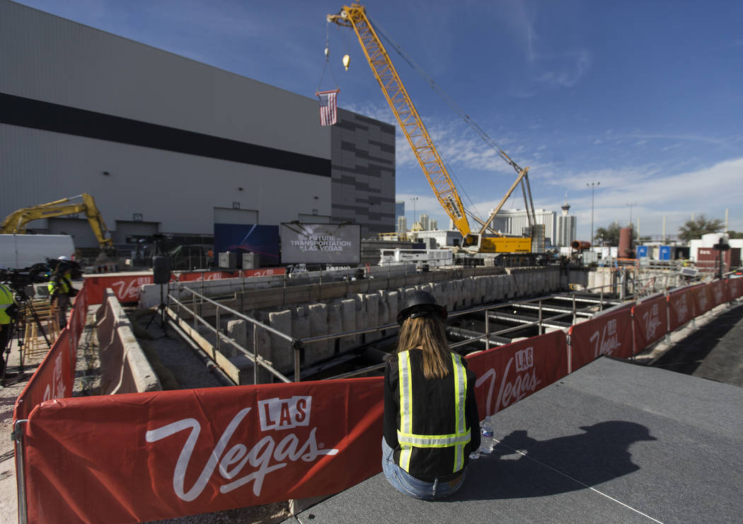 Media get a first glimpse at a tunnel boring machine at the future location of one of the under ...