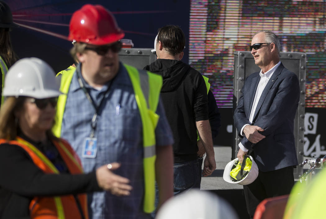 Steve Hill, right, Chief Executive Officer of the Las Vegas Convention and Visitors Authority, ...