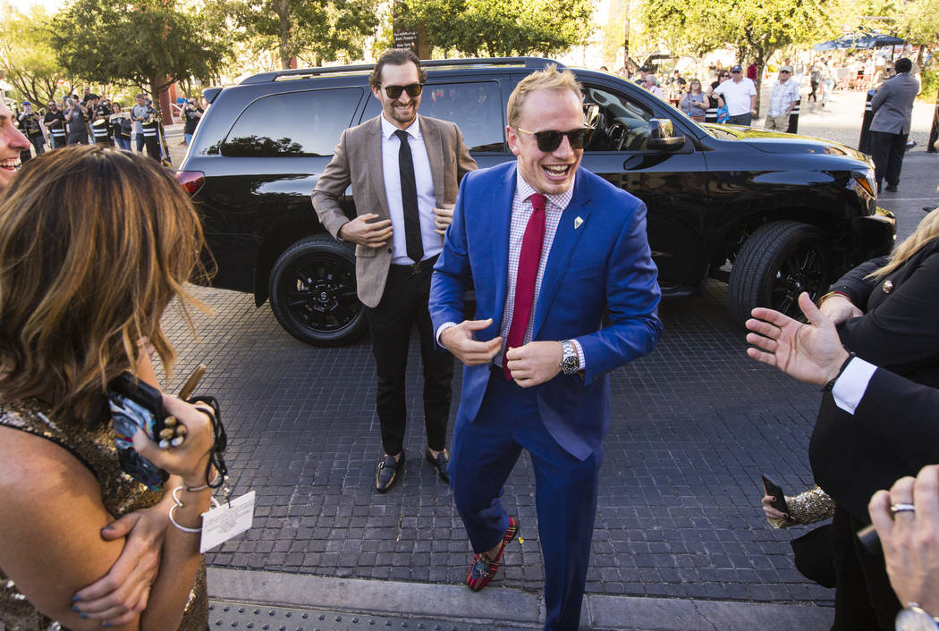 Golden Knights' Mark Stone, left, and Nate Schmidt arrive for the gold carpet after arriving fo ...