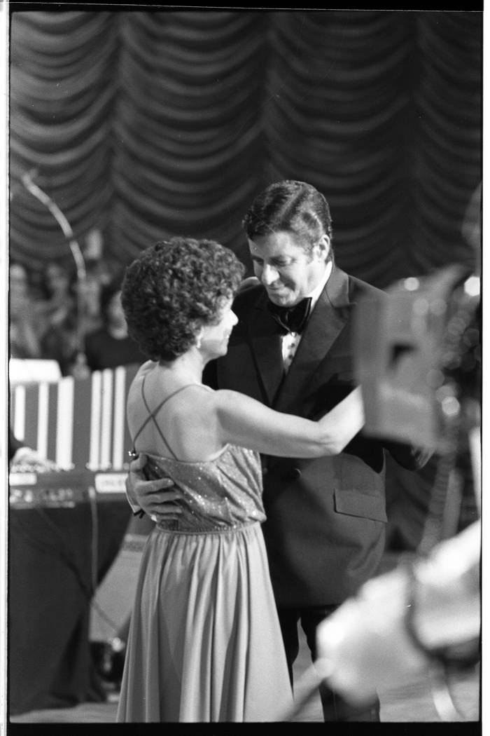 Jerry Lewis dances with an unidentified woman during the 15th annual Jerry Lewis Labor Day Tele ...
