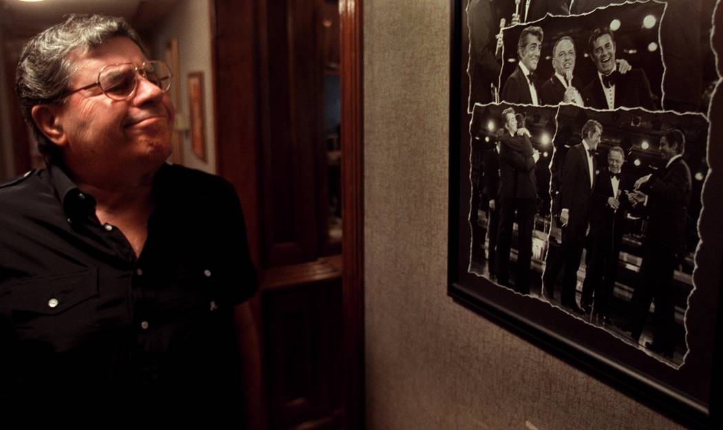 Jerry Lewis looks at photos from the time when Frank Sinatra reunited him with legendary partne ...