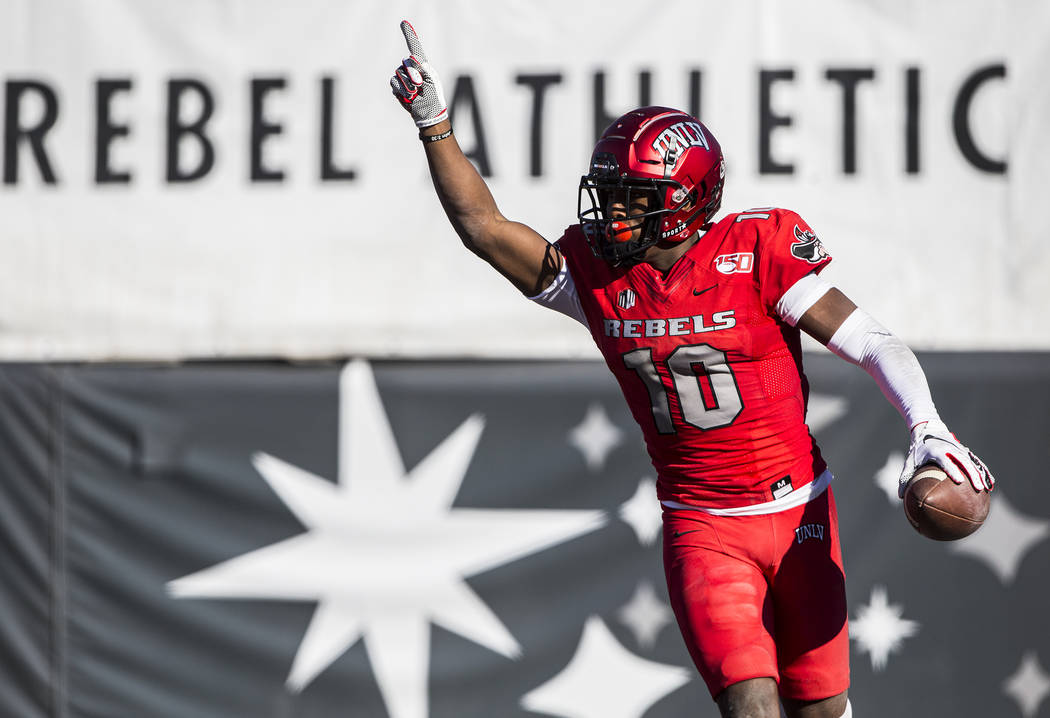 UNLV Rebels wide receiver Darren Woods Jr. (10) celebrates after scoring a touchdown in the fir ...