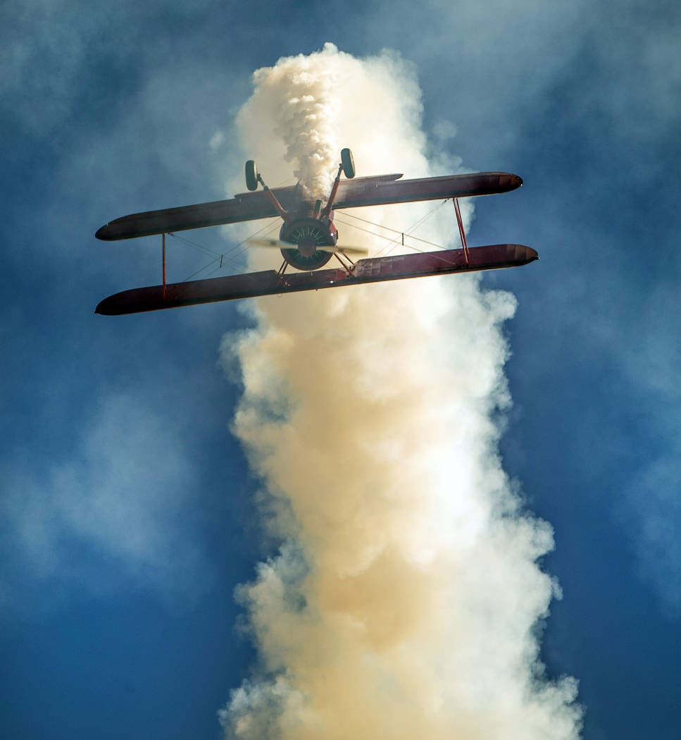 Vicky Benzing gets upside down in her 1940 Boeing Stearman during the Aviation Nation at Nellis ...