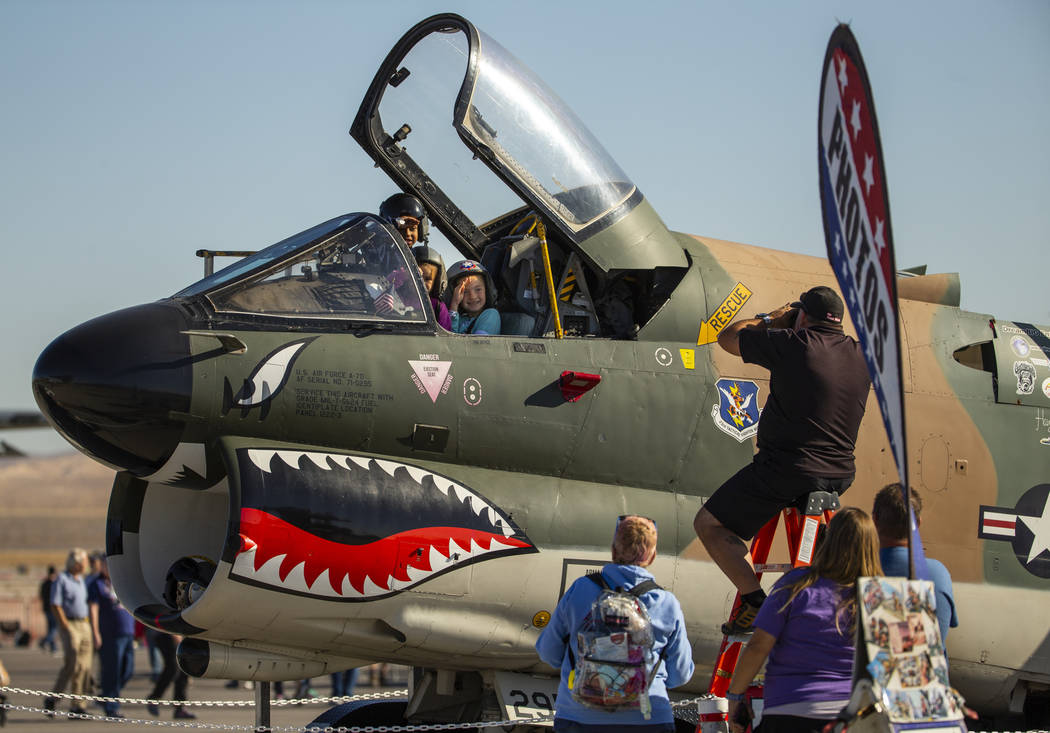 Attendees are able to have their pictures taken in an A-7D aircraft during the Aviation Nation ...
