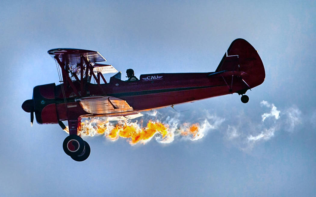 Vicky Benzing purposely stalls her 1940 Boeing Stearman to sputter out flames momentarily durin ...