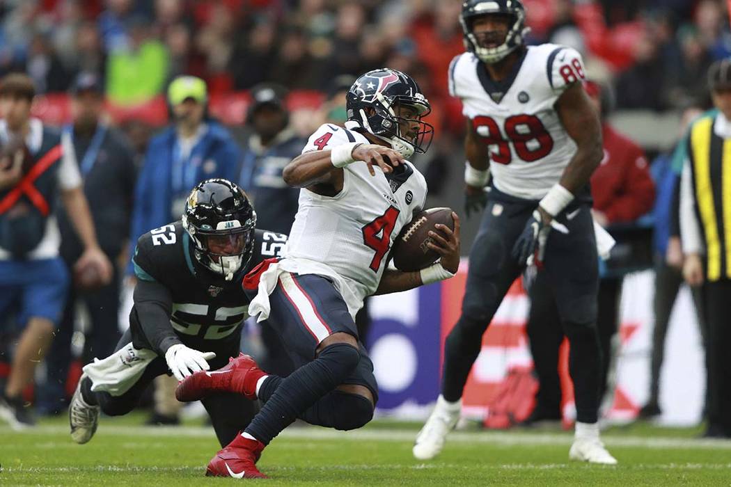 Houston Texans quarterback Deshaun Watson (4) runs down field against the Jacksonville Jaguars ...