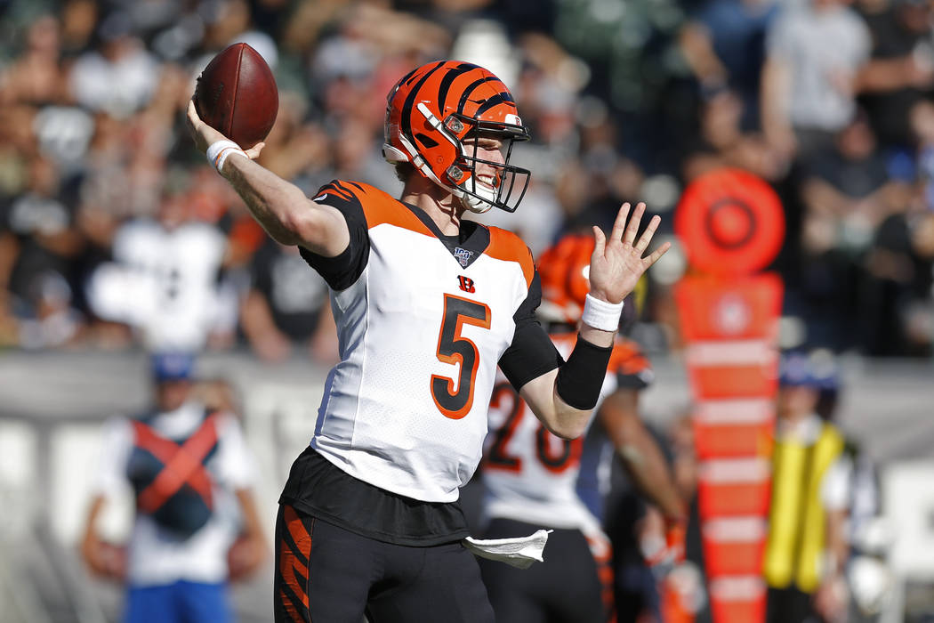 Cincinnati Bengals quarterback Ryan Finley throws during the first half of an NFL football game ...