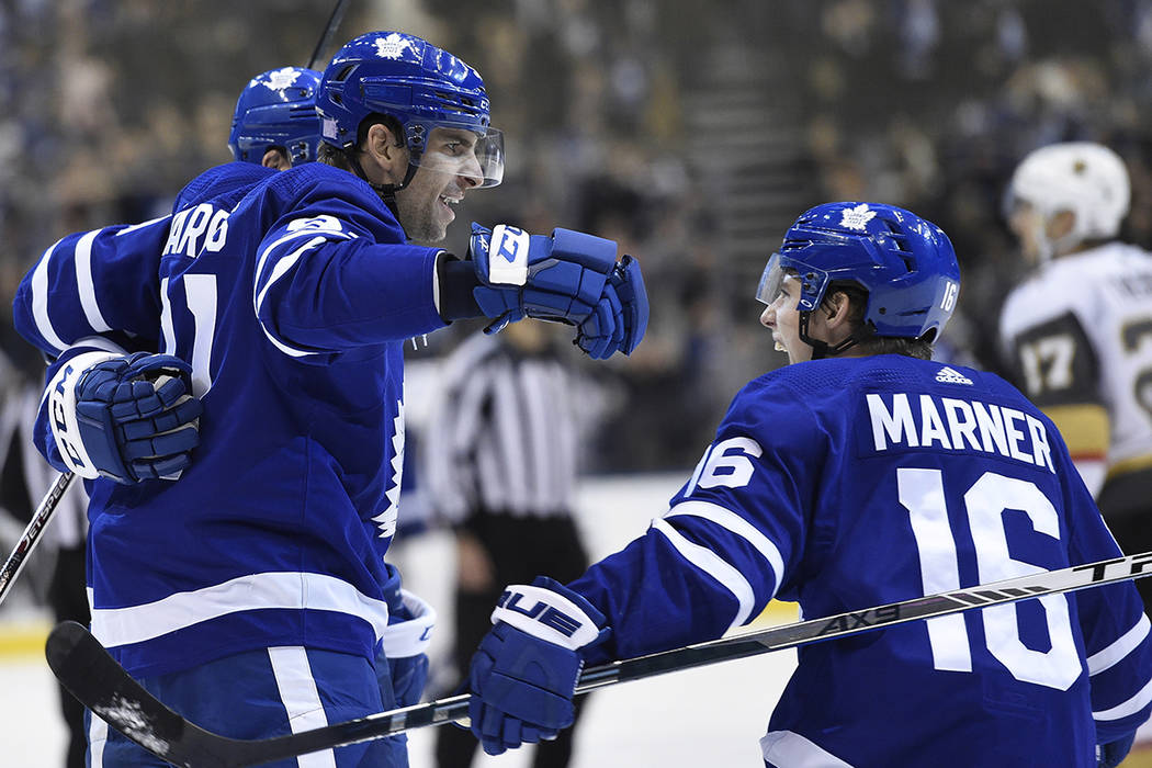 Toronto Maple Leafs center John Tavares (91) celebrates his overtime goal against the Vegas Gol ...