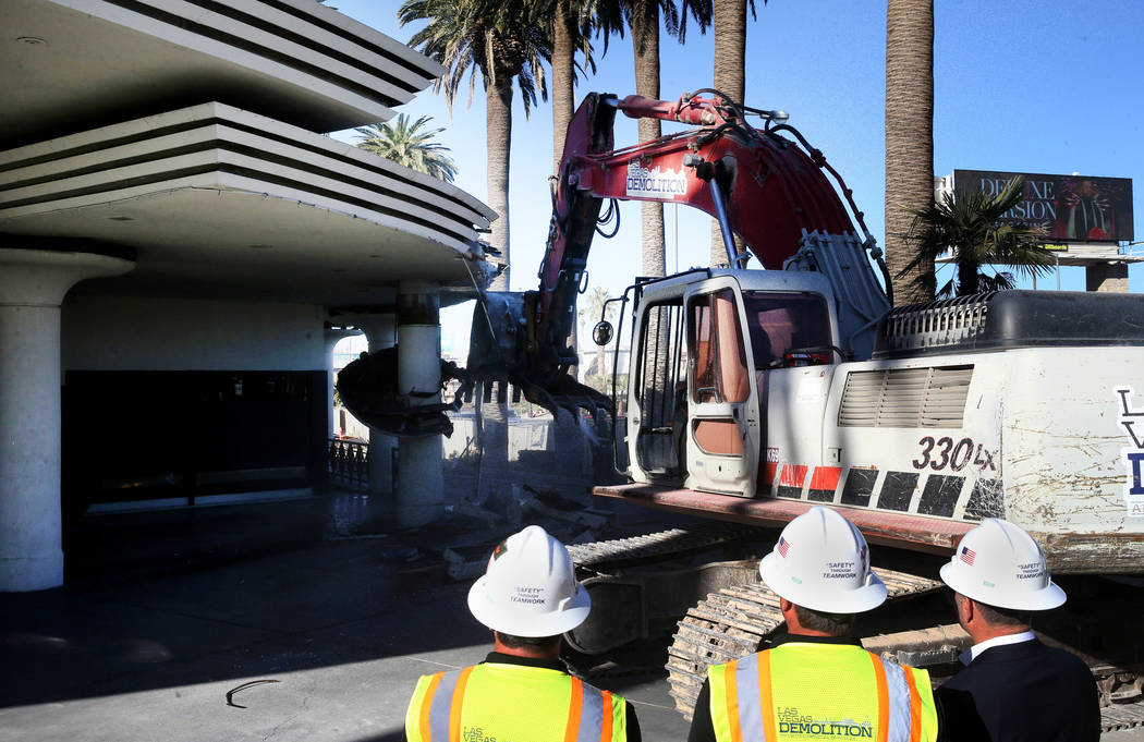 Crews from Las Vegas Demolition and Environmental Services demolish the Hard Rock Cafe in Las V ...