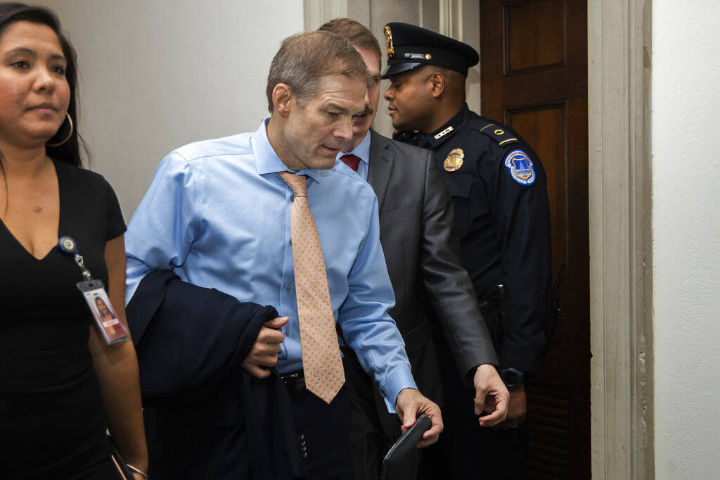 Rep. Jim Jordan, R-Ohio, leaves the hearing room as they conclude the public impeachment hearin ...