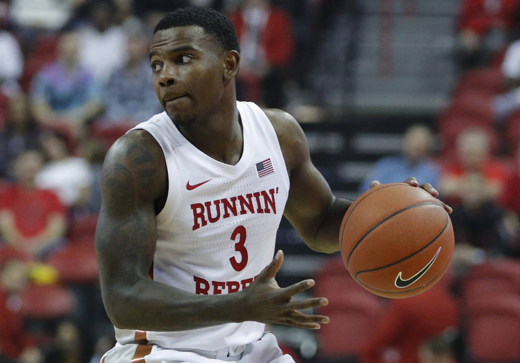 UNLV's Amauri Hardy (3) plays against Kansas State in an NCAA college basketball game Saturday, ...