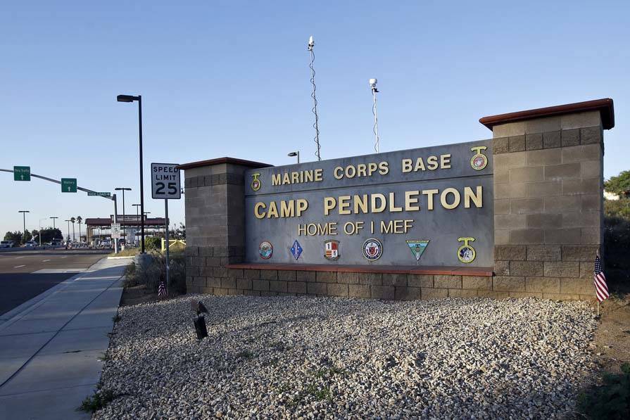 The main gate of Camp Pendleton Marine Base at Camp Pendleton, Calif. (AP Photo/Lenny Ignelzi, ...