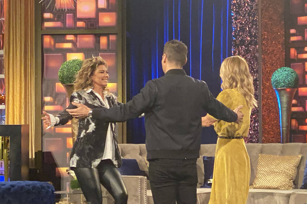 Shania Twain is greeted by Ryan Seacrest and Kelly Ripa on a taping of "Live With Kelly And Rya ...