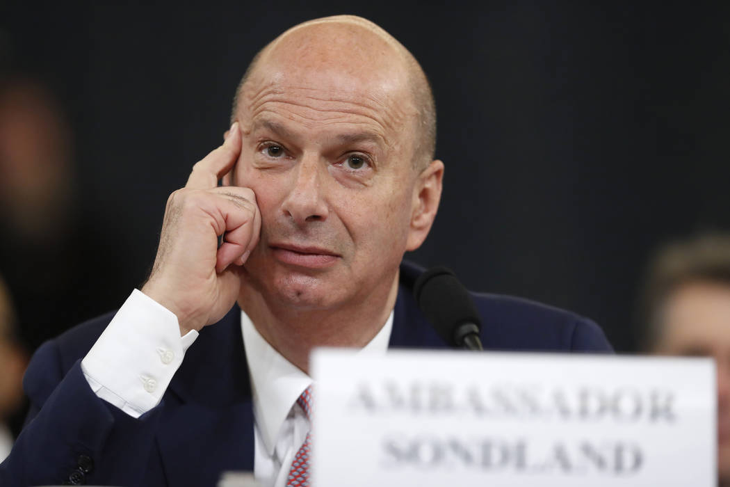 U.S. Ambassador to the European Union Gordon Sondland listens as he testifies before the House ...