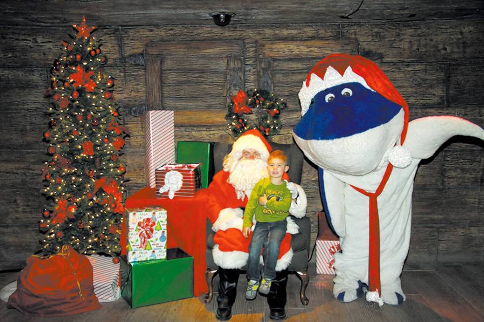 Santa Jaws greets children at the Shark Reef Aquarium. (Shark Reef)