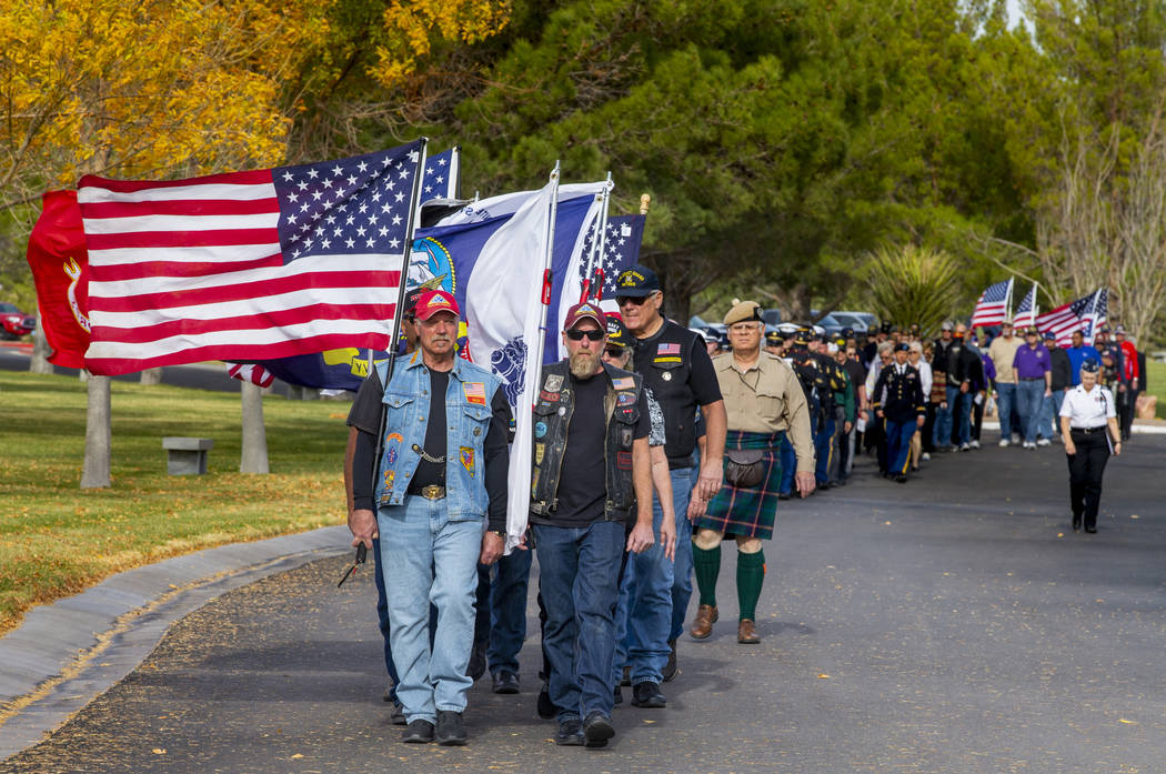 Nevada Patriot Guard Riders carry the American flag and those of all military branches during t ...