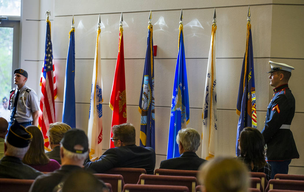 An American flag and those of each military service branch are displayed during the third Missi ...
