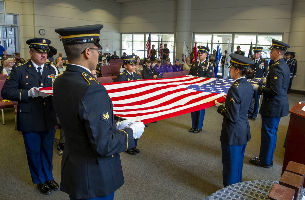 Army Honor Guard soldiers conduct a flag folding presentation during the third Missing in Nevad ...
