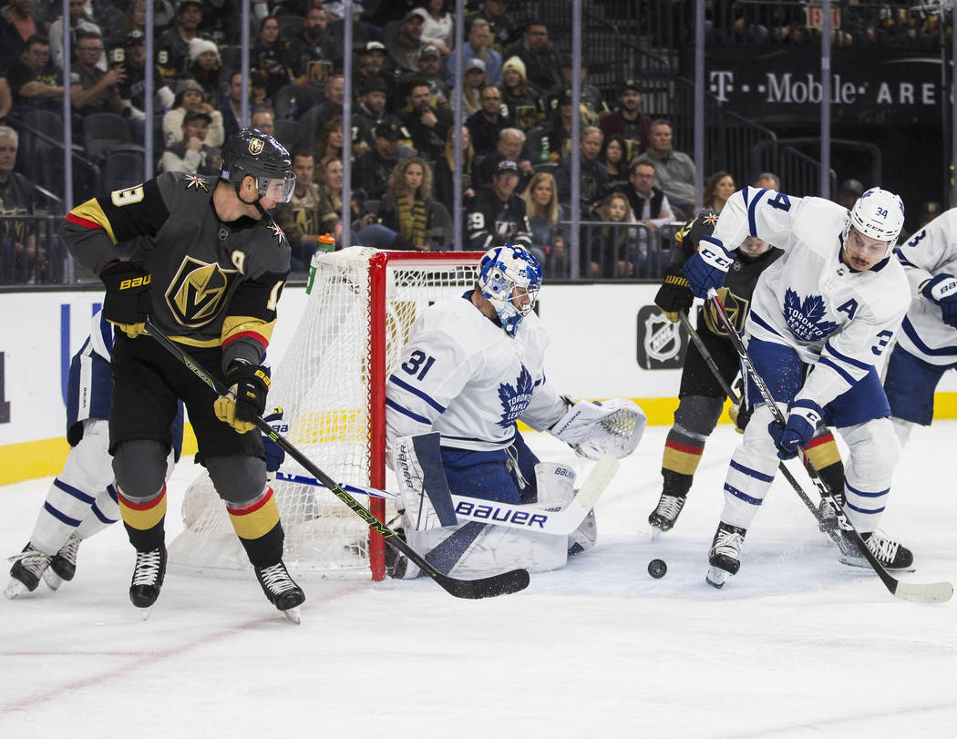 Vegas Golden Knights right wing Reilly Smith (19) shoots on Toronto Maple Leafs goaltender Fred ...