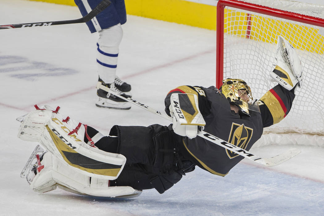 Vegas Golden Knights goaltender Marc-Andre Fleury (29) makes a diving save in the third period ...