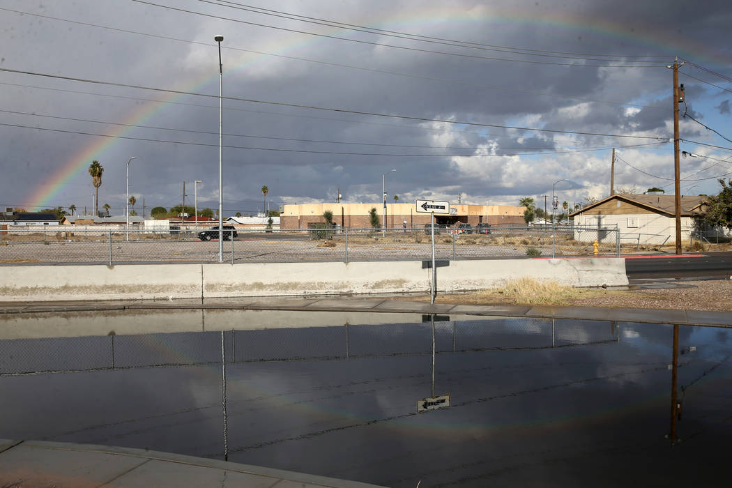 A rainbow over standing rain water on G Street near Owens Avenue in Las Vegas Wednesday, Nov. 2 ...