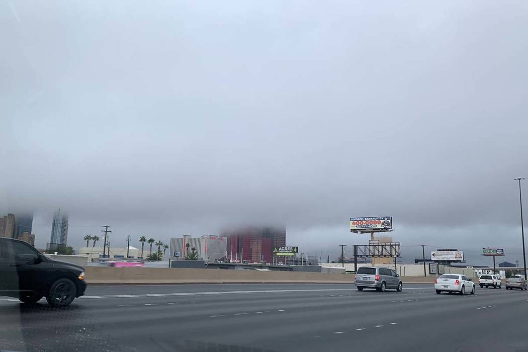 Clouds shroud the top of Resorts World under construction on the Las Vegas Strip, Wednesday, No ...