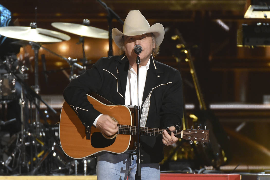 Dwight Yoakam performs "Guitars, Cadillacs" at the 50th annual CMA Awards at the Brid ...