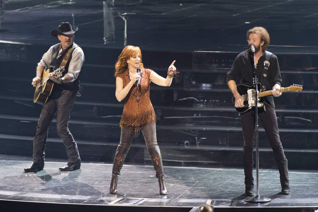 Reba McEntire and Brooks & Dunn perform together at The Colosseum at Caesars Palace in Las ...