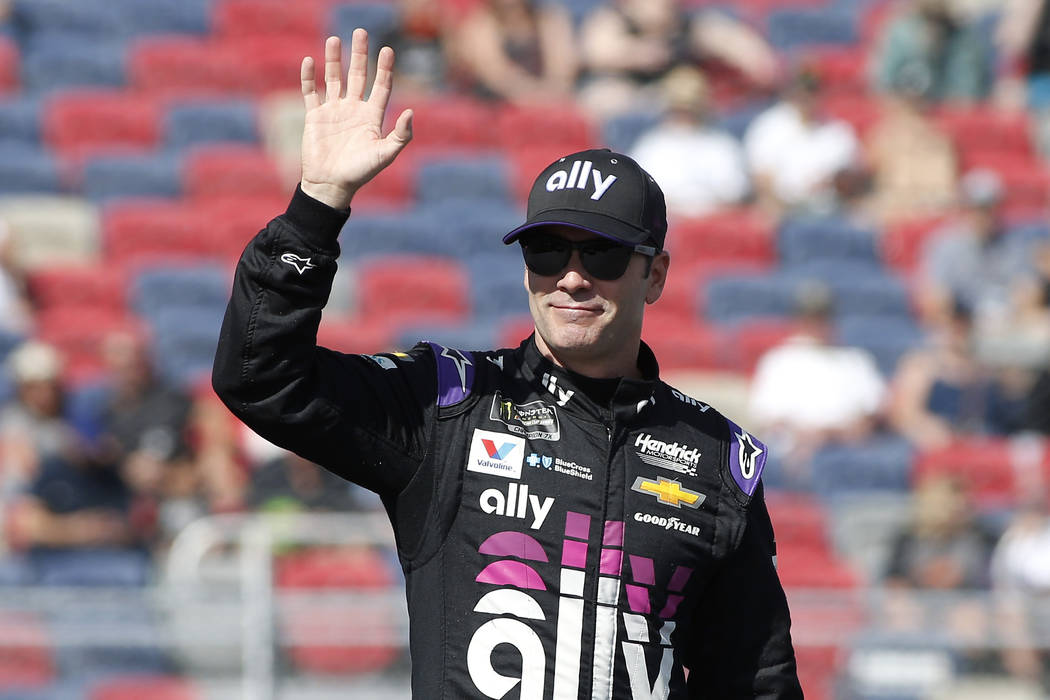 FILE - In this Nov. 10, 2019, file photo, Jimmie Johnson waves during driver introductions prio ...