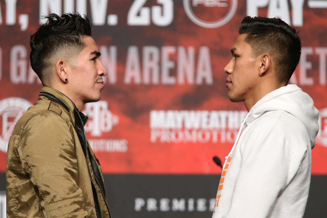 Leo Sant Cruz, left, and Miguel Flores, pose during a press conference at the MGM Grand Garden ...