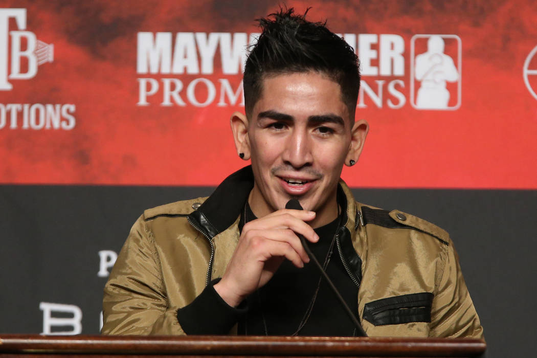 Leo Santa Cruz speaks during a press conference at the MGM Grand Garden Arena in Las Vegas, Wed ...