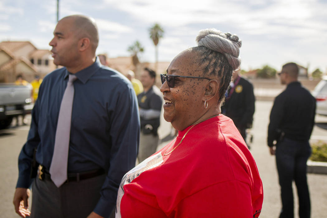 Las Vegas police homicide Lt. Ray Spencer, left, and Sheilah Johnson, grandmother of homicide v ...