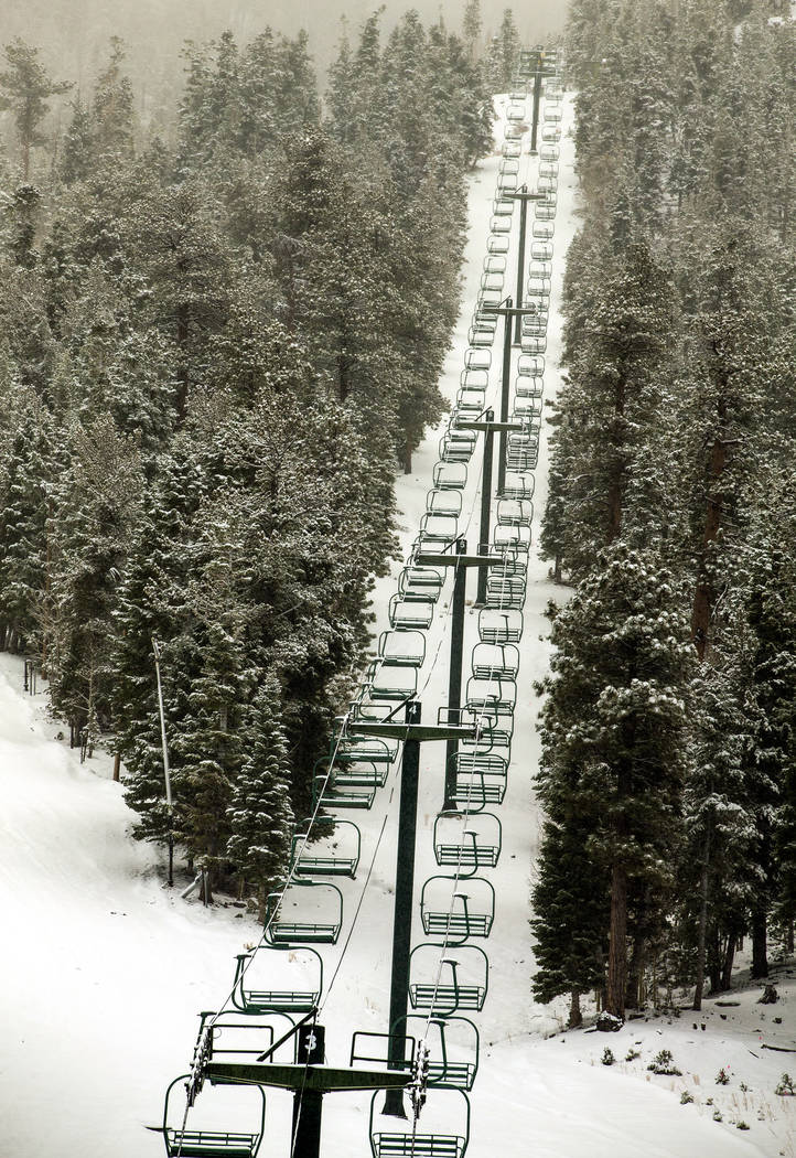 Snow continues to fall about the Lee Canyon ski resort at Mt. Charleston on Wednesday, Nov. 20, ...