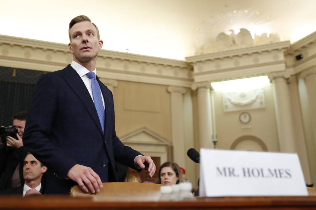 David Holmes, a U.S. diplomat in Ukraine, returns from a break to testify before the House Inte ...