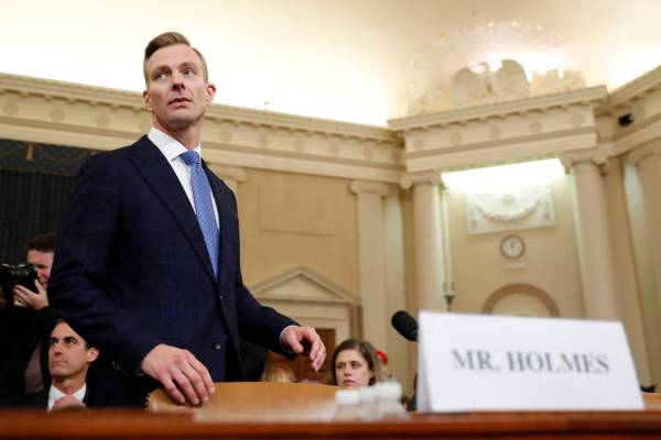 David Holmes, a U.S. diplomat in Ukraine, returns from a break to testify before the House Inte ...