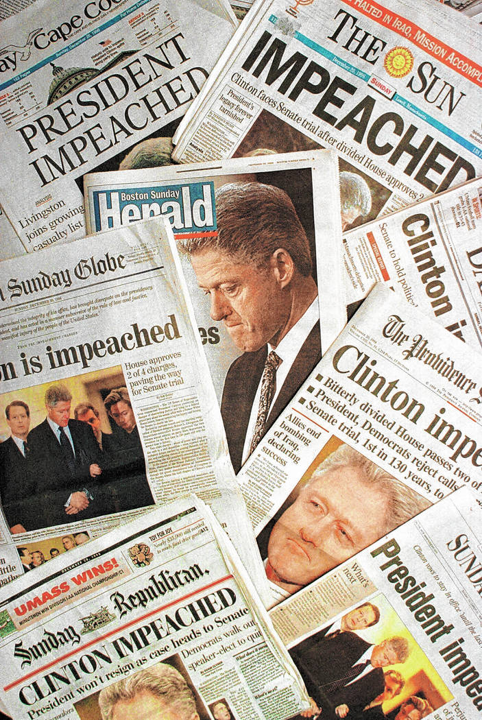 This is a photo montage showing the Sunday, Dec. 20, 1998 editions of newspapers from Massachus ...