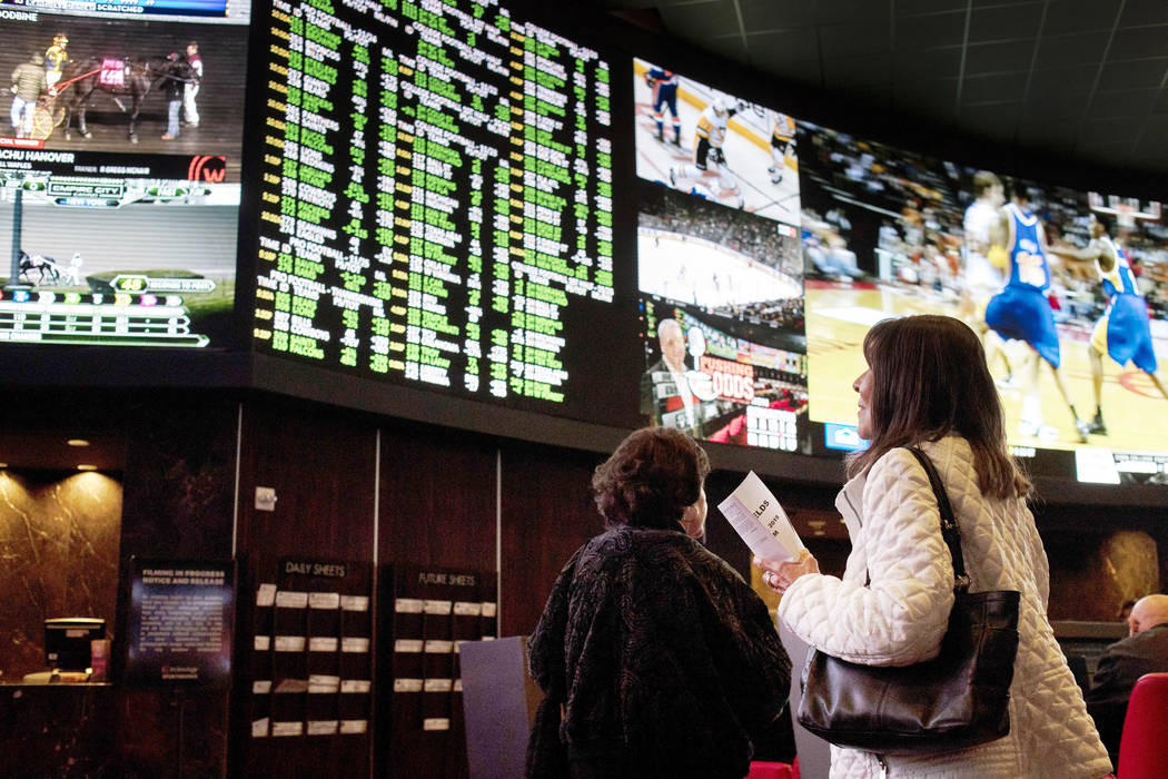 Gamblers at the Palms sportsbook on Thursday, Nov. 21, 2019, in Las Vegas. (Ellen Schmidt/Las V ...