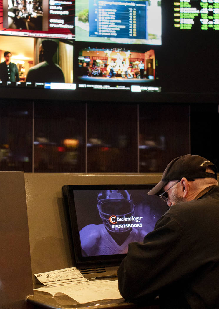 A gambler at the Palms sportsbook on Thursday, Nov. 21, 2019, in Las Vegas. (Ellen Schmidt/Las ...