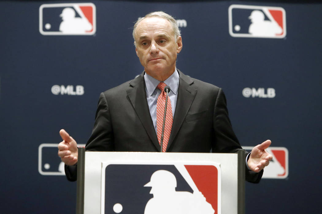 Baseball commissioner Rob Manfred speaks to the media at the owners meeting in Arlington, Texas ...