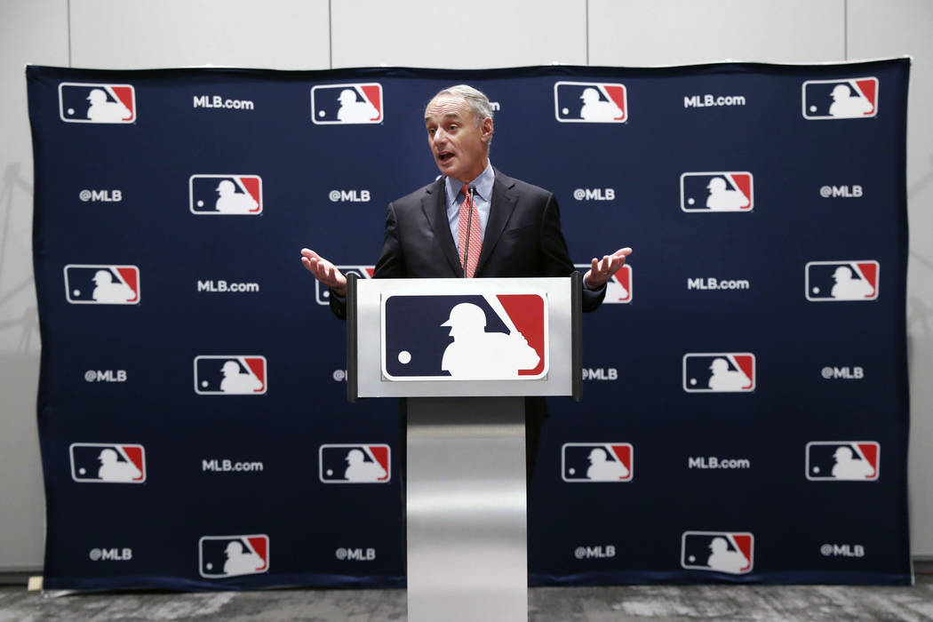 Baseball commissioner Rob Manfred speaks to the media at the owners meeting in Arlington, Texas ...