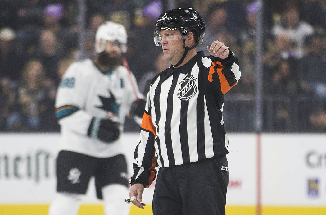 Referee Dan O'Halloran works the Vegas Golden Knights, San Jose Sharks NHL hockey game on Thurs ...