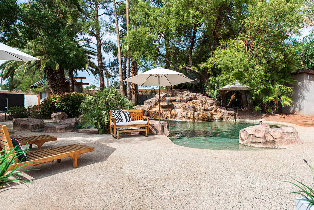 The backyard of the main house is designed like a resort. (Simply Vegas)