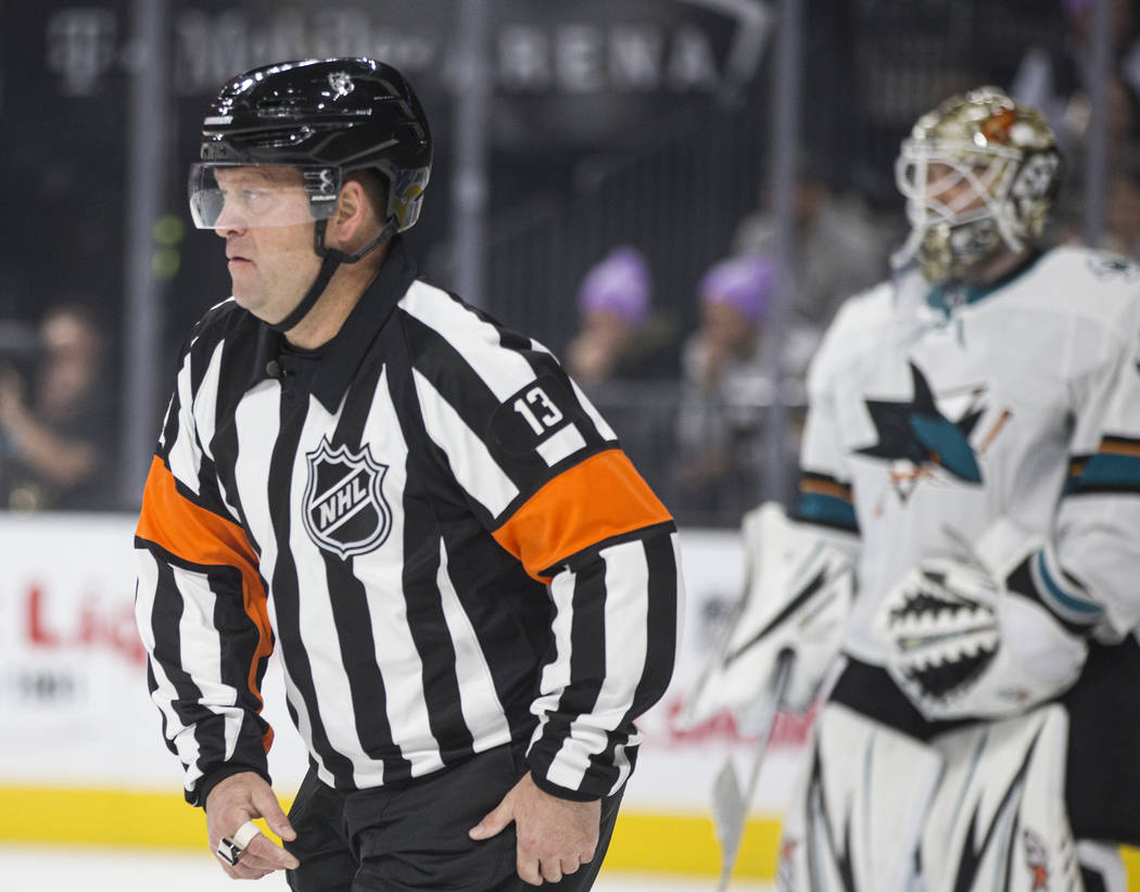 Referee Dan O'Halloran works the Vegas Golden Knights, San Jose Sharks NHL hockey game on Thurs ...