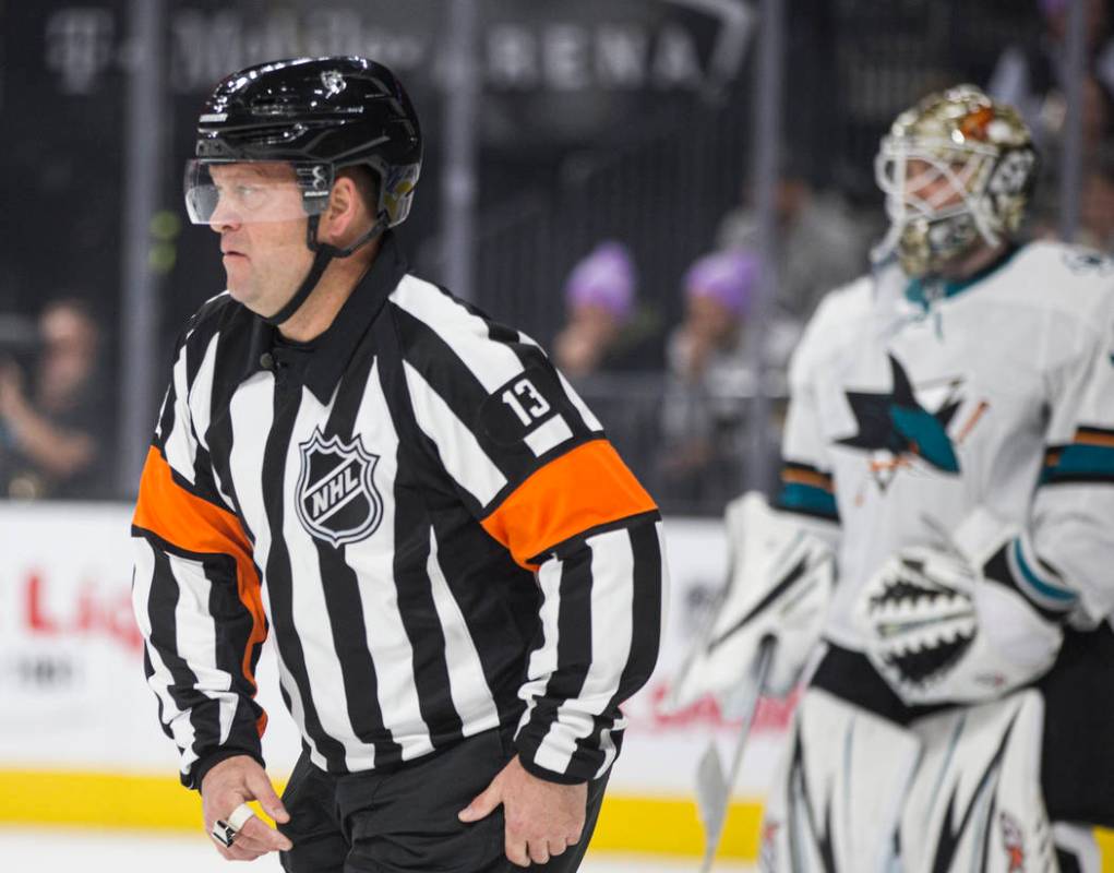 Referee Dan O'Halloran works the Vegas Golden Knights, San Jose Sharks NHL hockey game on Thurs ...