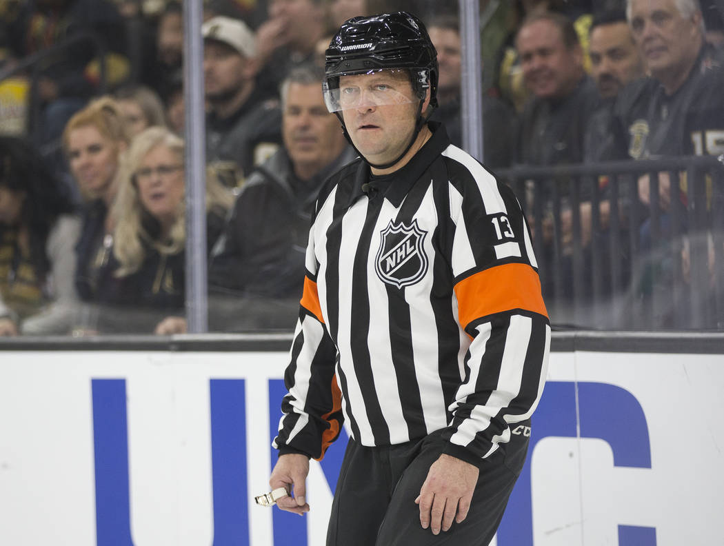 Referee Dan O'Halloran works the Vegas Golden Knights, San Jose Sharks NHL hockey game on Thurs ...