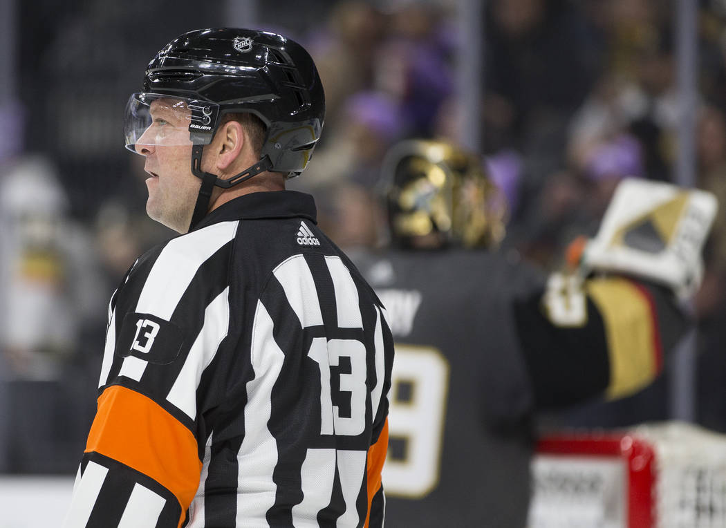 Referee Dan O'Halloran works the Vegas Golden Knights, San Jose Sharks NHL hockey game on Thurs ...