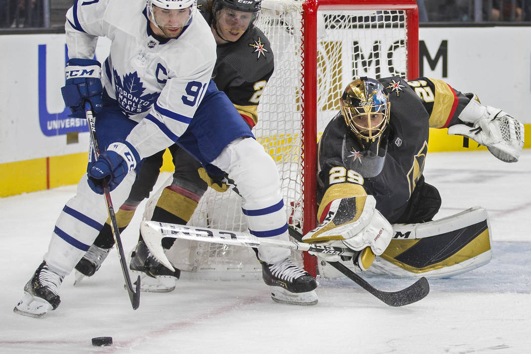 Vegas Golden Knights goaltender Marc-Andre Fleury (29) makes a poke save against Toronto Maple ...